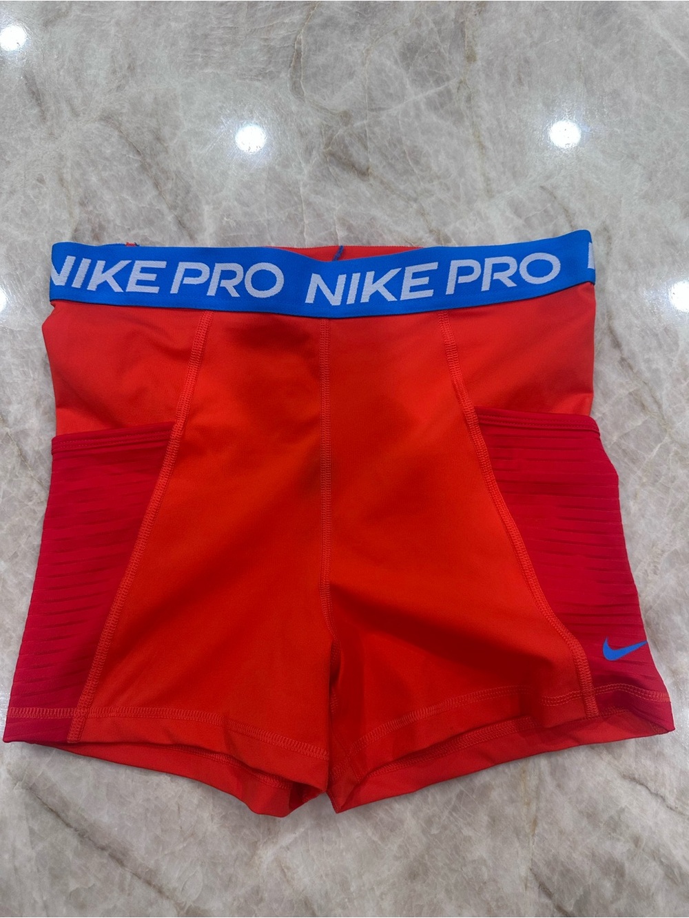Women Nike Red Compression Shorts with Blue Waistband